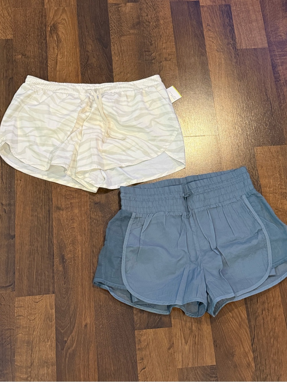 Lot of 2 pair Women’s Old Navy Active shorts - 1 NWT, both size MEDIUM